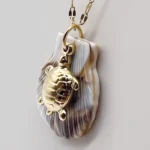 NEFERU Golden Turtle on Shell Necklace - Image 2